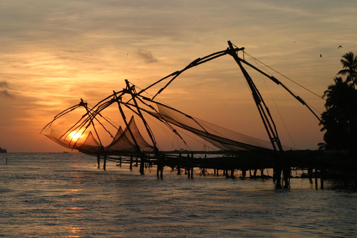 An image of empty fishing nets drifting in the ocean, symbolizing the depletion of marine resources due to overfishing and the need for sustainable practices.