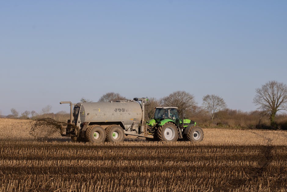 An image showcasing innovative waste management practices in livestock farming, such as anaerobic digestion and the use of digestate as natural fertilizer.